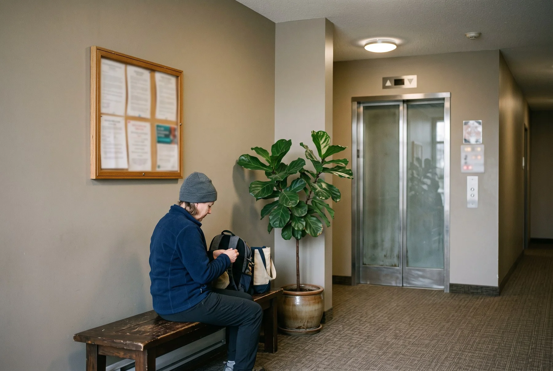 A landlord reviewing strata bylaws and a tenancy agreement for a rented condo